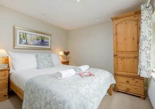 Self Catering Cottage new Forest Downstairs bedroom with view of garden Beck Cottage