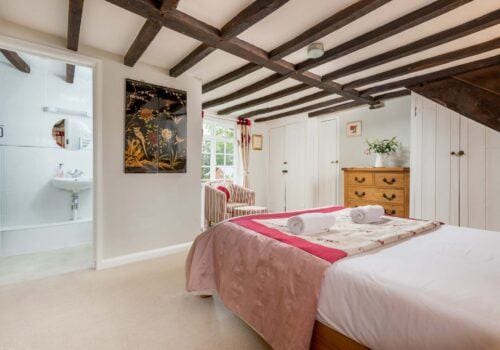 Self Catering Cottage Beck Cottage master en-suite with seating area and garden views