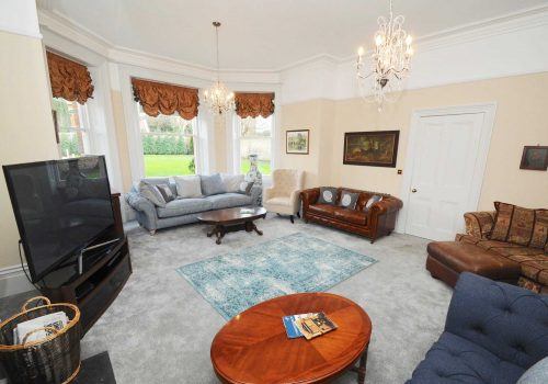The spacious lounge at Quay House with striking decor