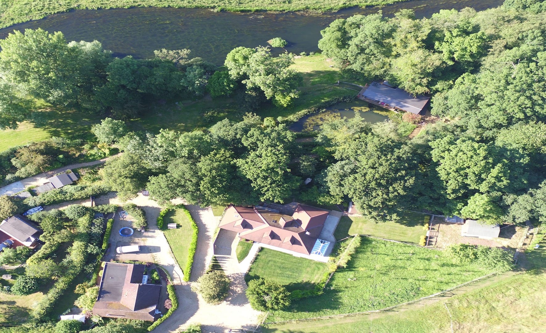 Aerial view of holiday homes by the river