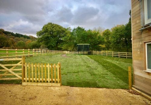 Blackdown Views newly freshly laid lawn with large trampoline