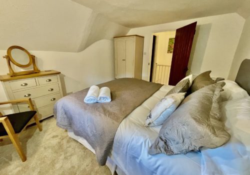 Cottage bedroom in self catering Dorset holiday let