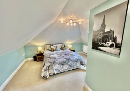 Attic bedroom in Salisbury Holiday Home