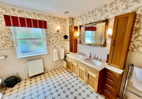 Double sink in master bedroom, classic in style and useful in nature.