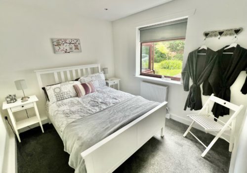 Ground floor bedroom with views out to the garden