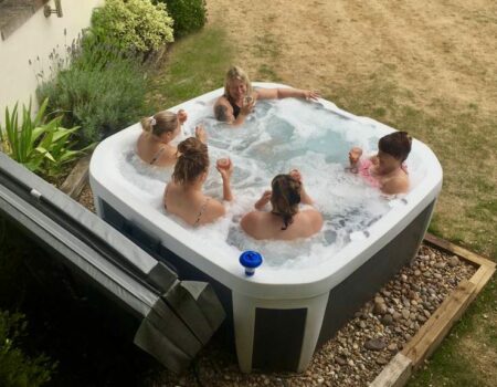 ladies making the use of the hot tub