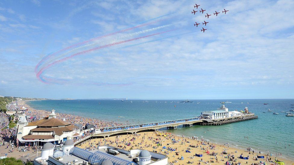 Red Arrows flying over Bournemouth Beach