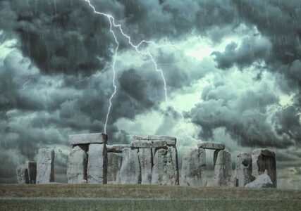 Stonehenge during a thunderstorm, showing lightning and rain. Wiltshire.