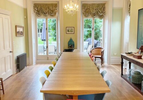 Rectory tables and festoon blinds in a georgian Dorset holiday home