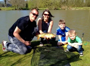 994744_10153359061743581_9216529172095386491_n South Farm guests enjoying fishing the lakes on their holiday